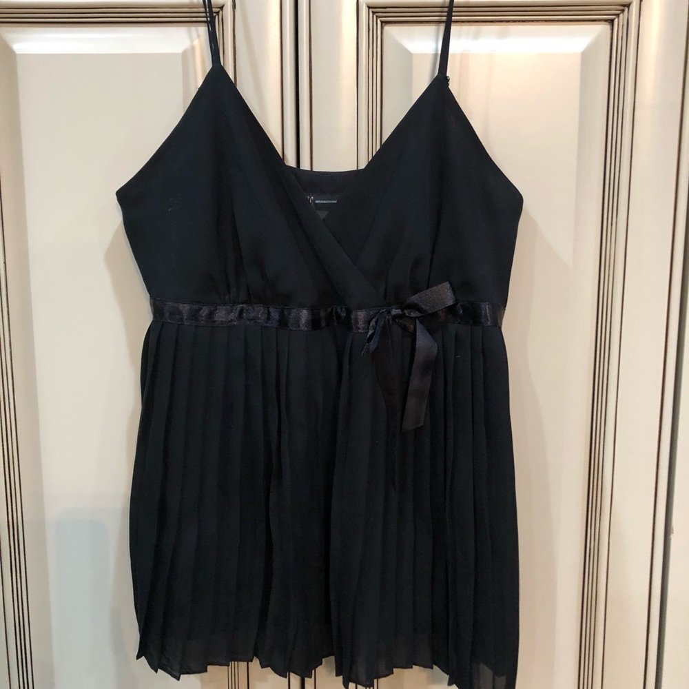 Black silk pleated cami with satin bow accent.
